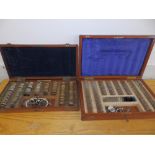 Two mahogany cased optometrist's lens sets - one by Davidson.