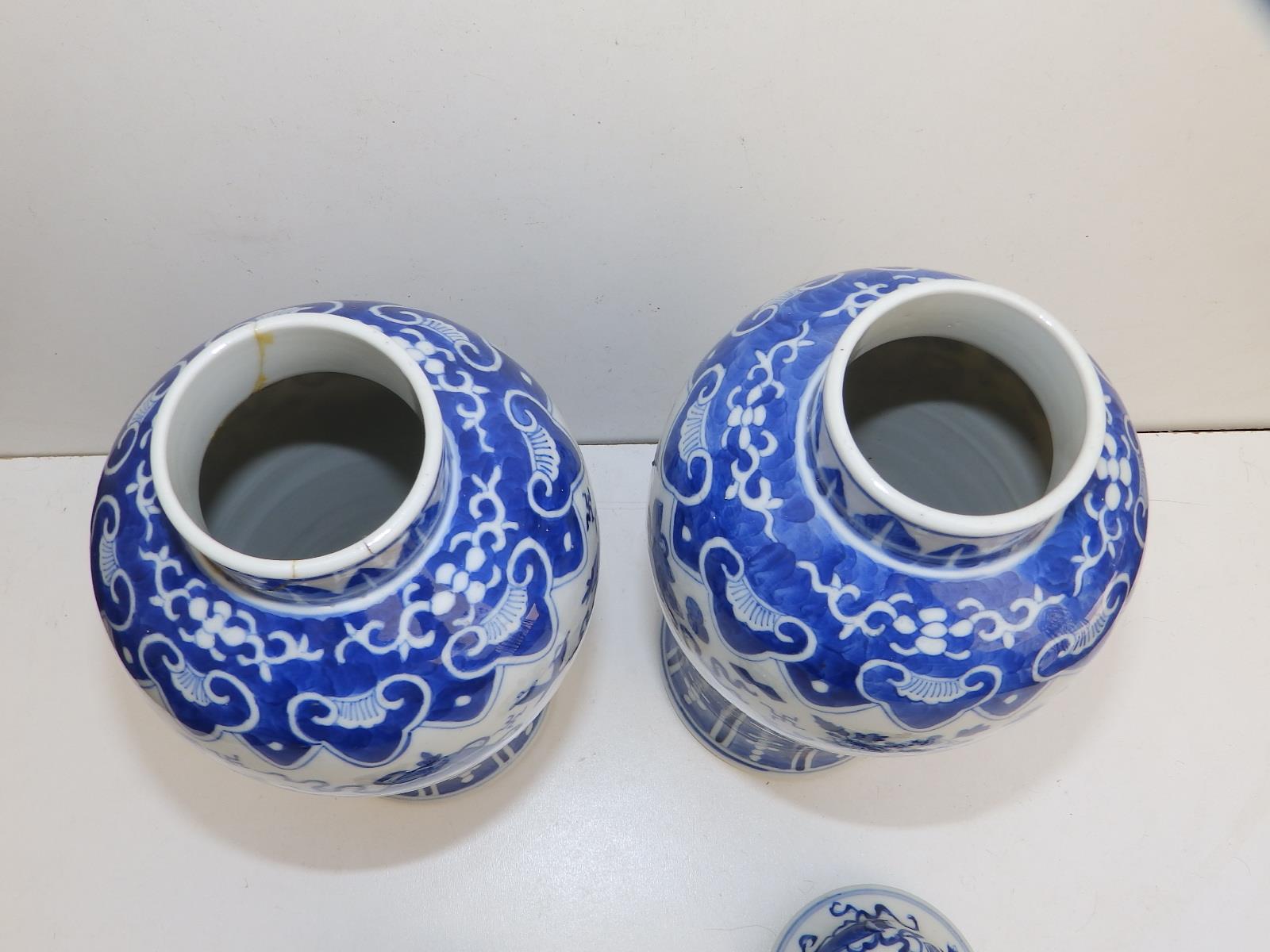 A pair of Chinese blue & white porcelain covered vases, lion finials to lids, the baluster bodies - Image 3 of 11