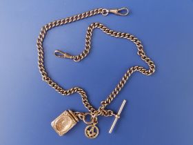 A 9ct gold curb link watch chain, each link stamped, with two pendant attachments, 17.5.
