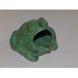 A green Glazed Dartmouth Pottery frog ashtray, 4" across.