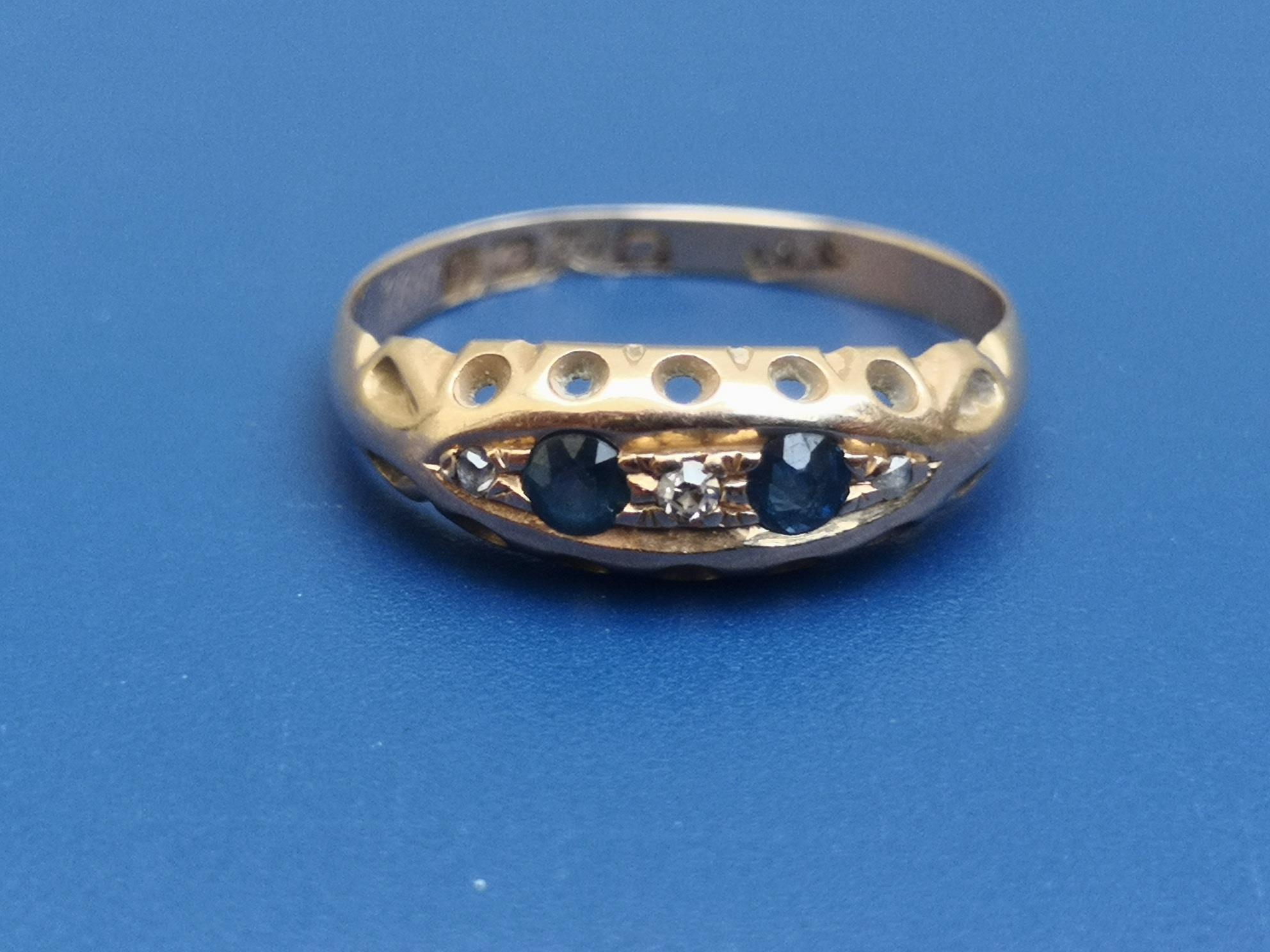 A small five stone sapphire & diamond set 18ct gold ring - Birmingham marks for 1915. Finger size