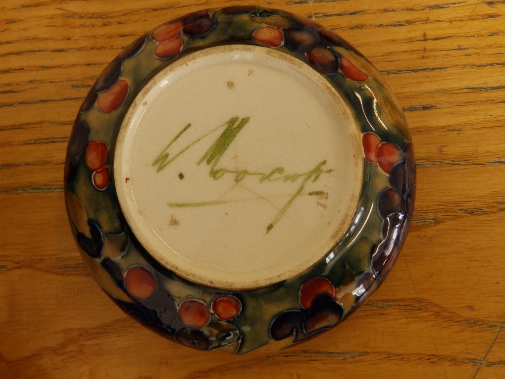 A small Moorcroft Pomegranate pattern bowl, 4.2" diameter - a/f, a covered Moorcroft jar, 5.5" - Image 4 of 5