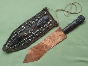 An African knife with copper blade on carved bone handle, 18".