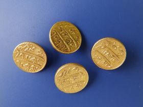 A set of four yellow metal buttons fashioned from Eastern coins (?), 15mm. (4)