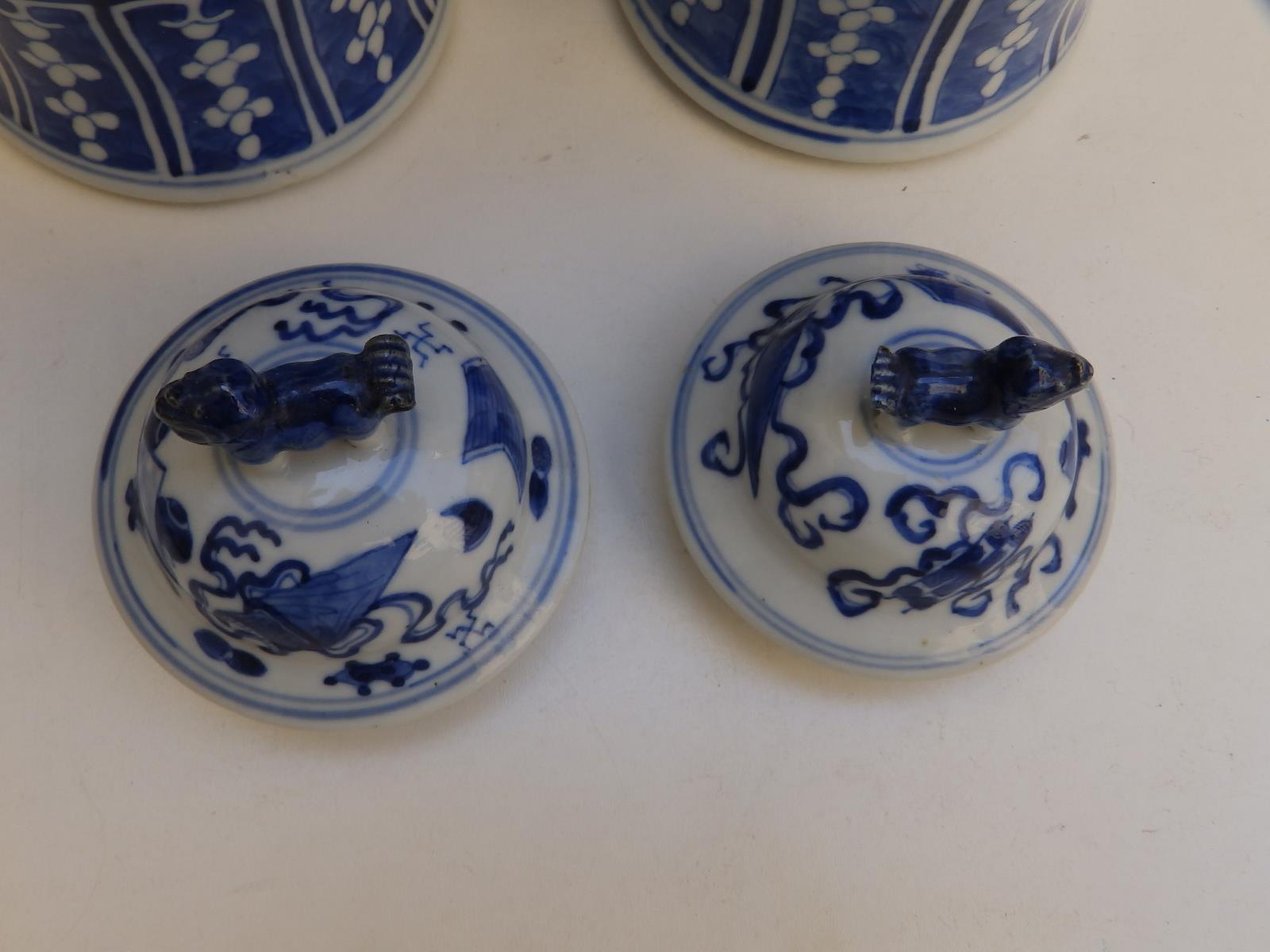 A pair of Chinese blue & white porcelain covered vases, lion finials to lids, the baluster bodies - Image 7 of 11