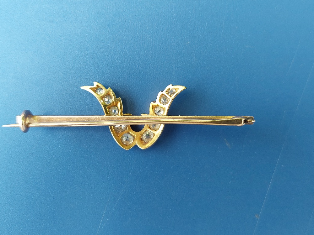 A late Victorian diamond set yellow metal bar brooch, the stones set as a stylised tulip head, 2". - Image 2 of 3