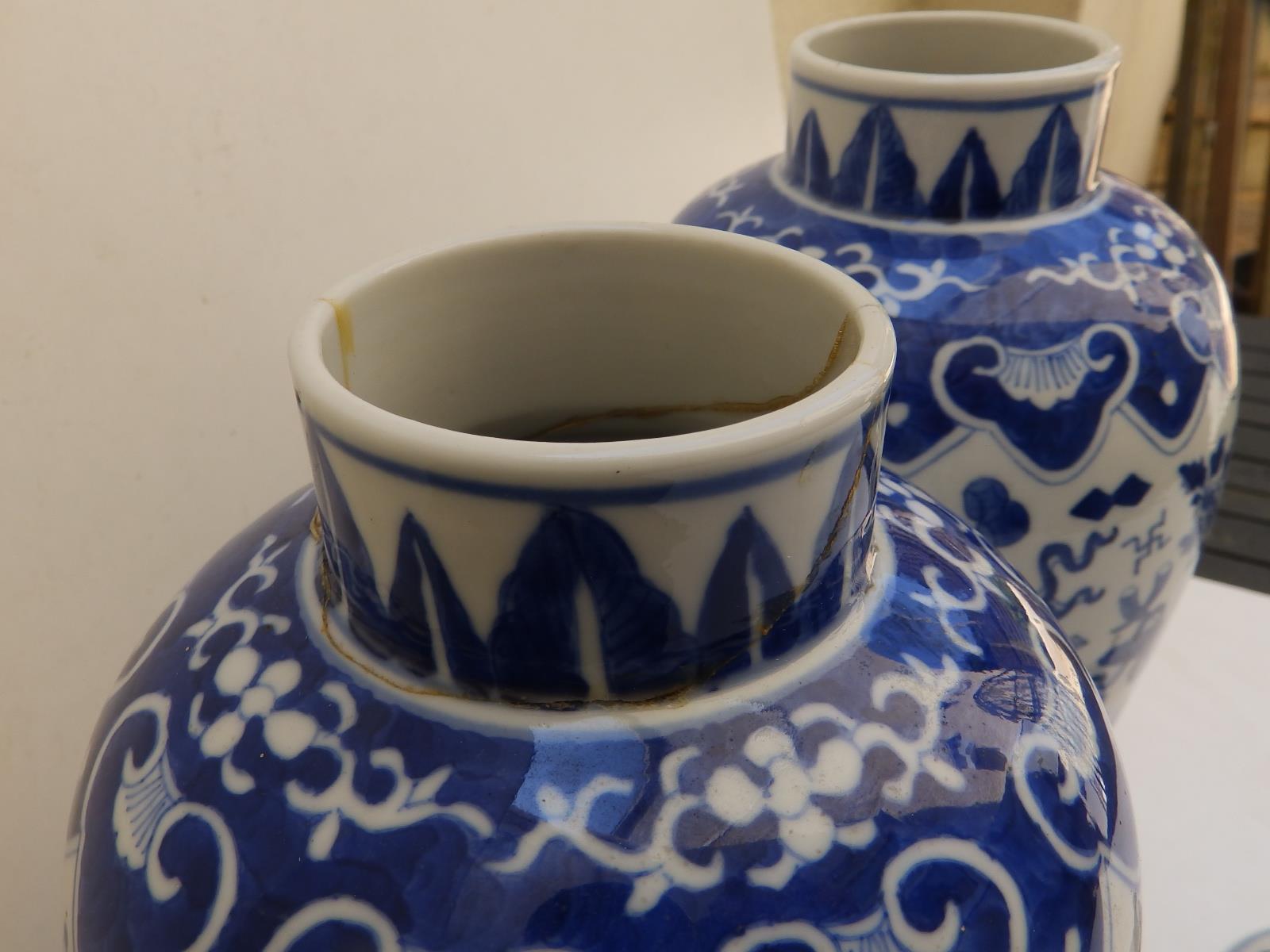 A pair of Chinese blue & white porcelain covered vases, lion finials to lids, the baluster bodies - Image 4 of 11