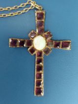 An opal and amethyst coloured cross pendant, 2" on yellow metal necklace chain.