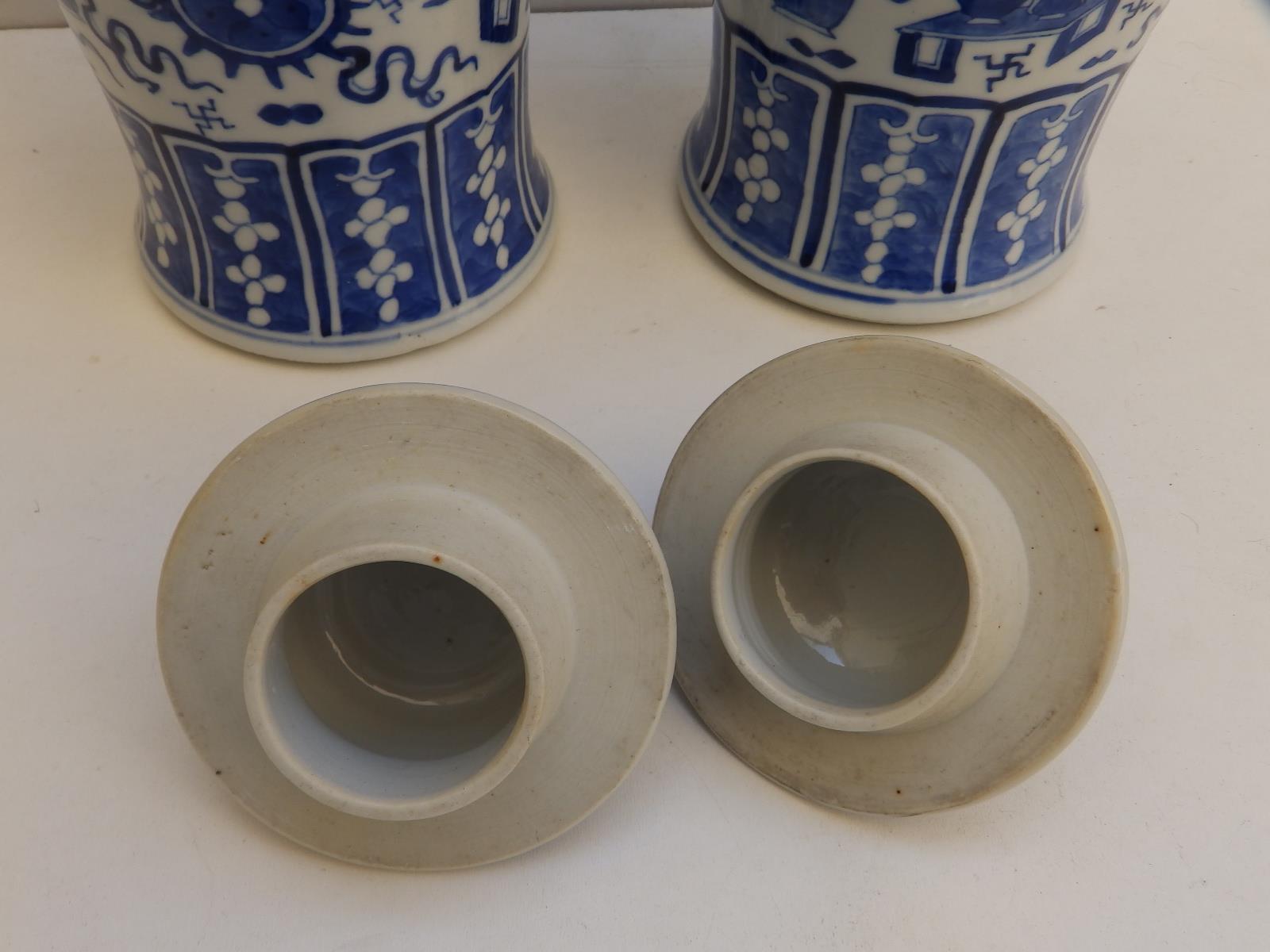 A pair of Chinese blue & white porcelain covered vases, lion finials to lids, the baluster bodies - Image 8 of 11