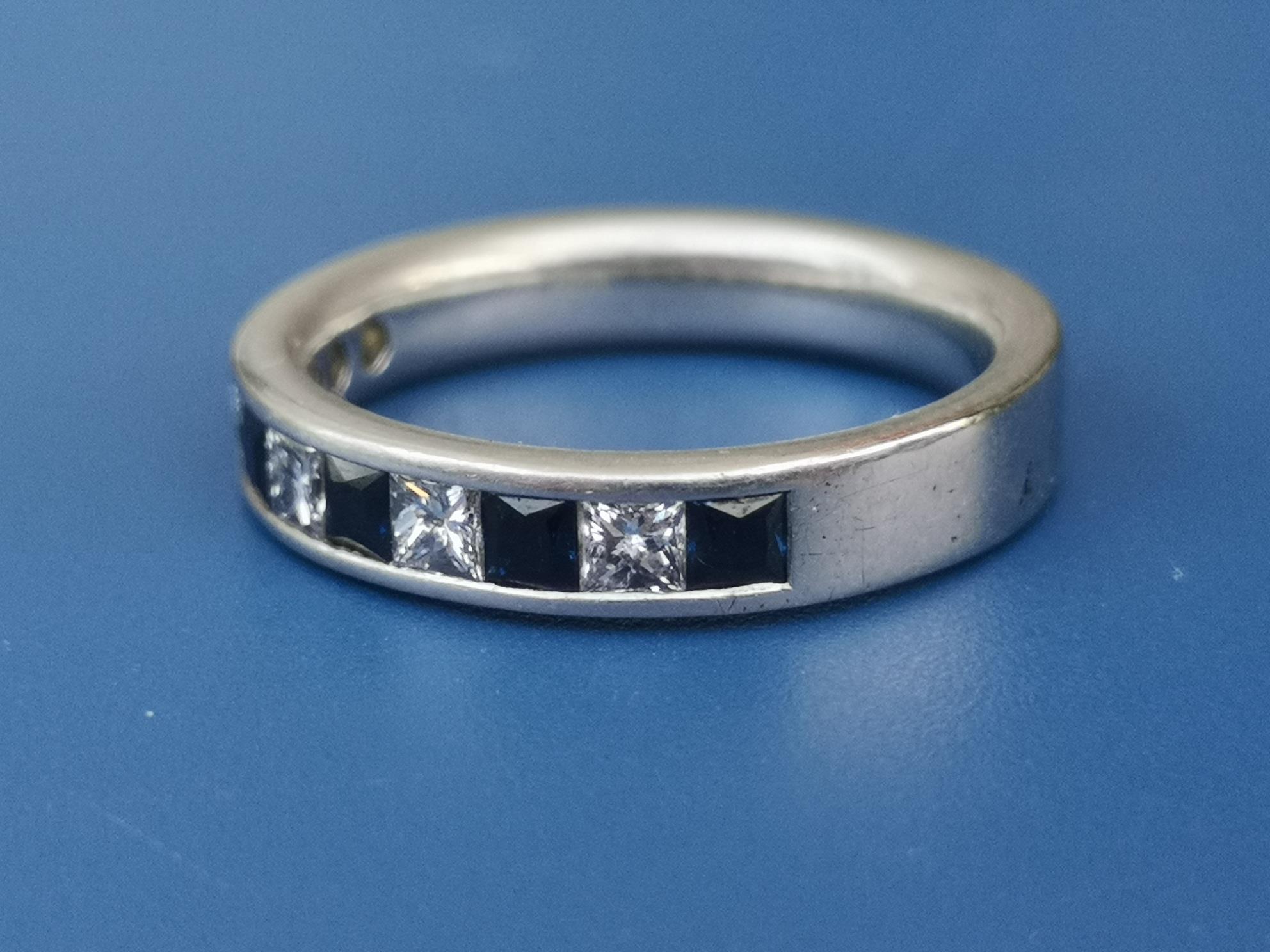 A sapphire & diamond calibre set platinum half eternity ring. Finger size M. - Image 3 of 5