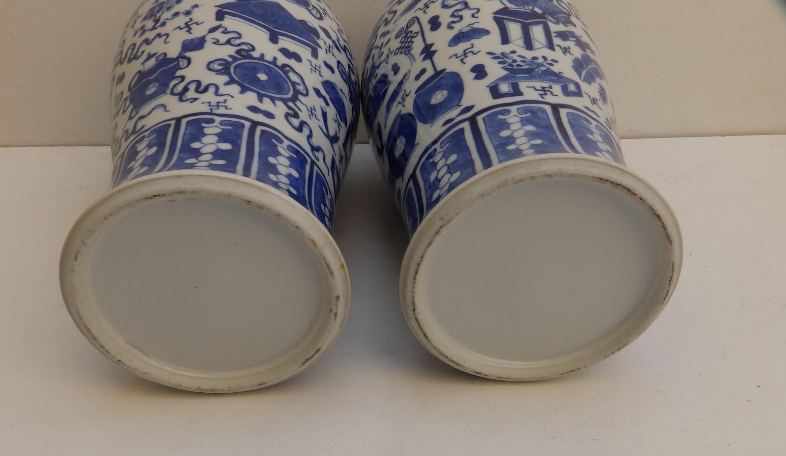 A pair of Chinese blue & white porcelain covered vases, lion finials to lids, the baluster bodies - Image 9 of 11