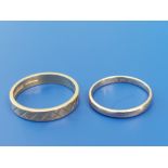 A patterned 22ct gold wedding ring, finger size N/O and a small old gold wedding ring, finger size