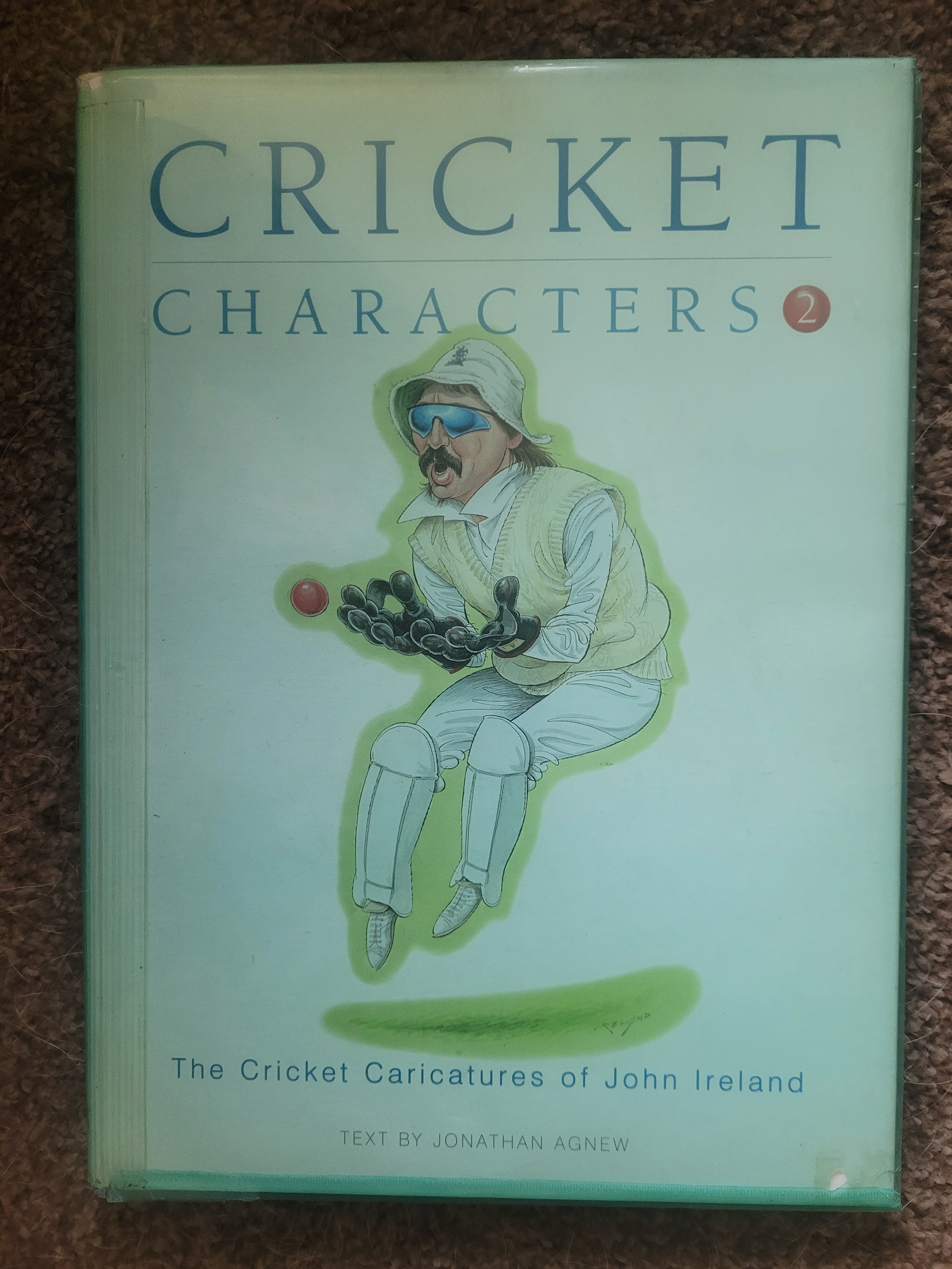 THE CRICKET CARICATURES OF JOHN IRELAND MULTI SIGNED BOOK