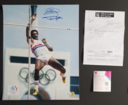 1984 OLYMPICS DALEY THOMPSON OFFICIAL AUTOGRAPHED PHOTO