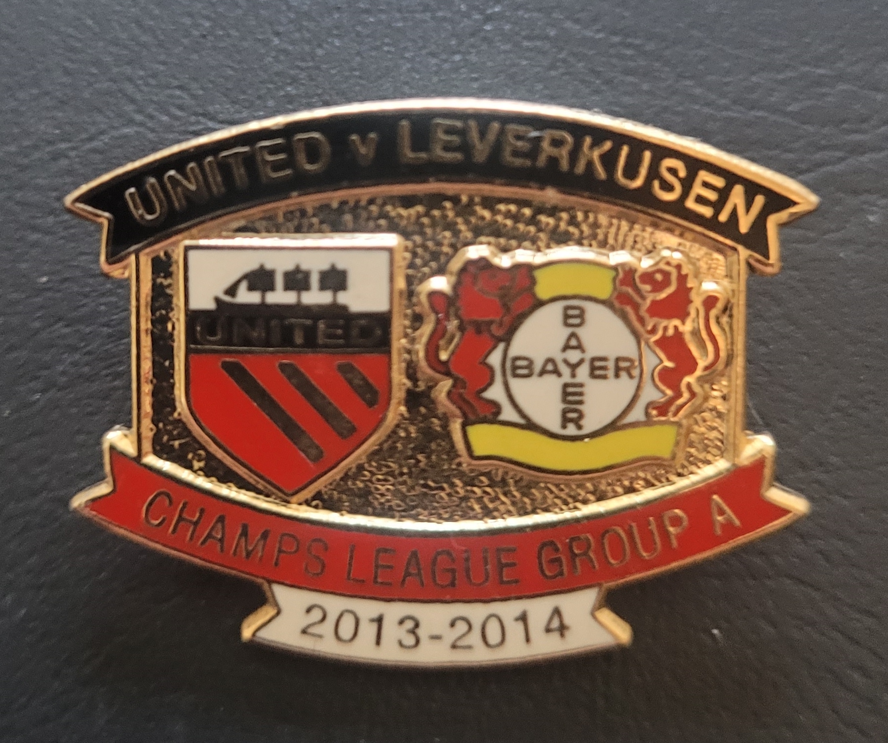 2013-14 CHAMPIONS LGE MANCHESTER UNITED V LEVERKUSEN BADGE