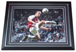 ARSENAL & HOLLAND DENNIS BERGKAMP AUTOGRAPHED & FRAMED PHOTO