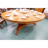 Substantial circular pollard oak dining table, height 75 cm,
