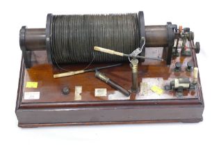 Runmkorrf induction coil on mahogany base