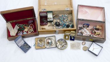 Three wooden and leather covered jewellery boxes containing costume jewellery