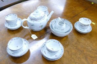 Collection of 19th century Newhall tea bowls, saucers, cream jug,