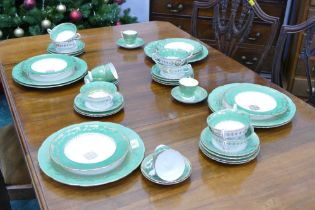 Minton green and gilt patterned part dinner and coffee service, Pattern No.
