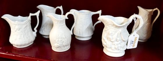 Six Portmeirion Parian style jugs