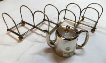 Small plated teapot etched Sproat Savoy Cafe Carlisle and an extending toast rack