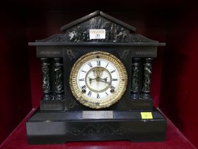 Slate mantle clock presented to T.B.