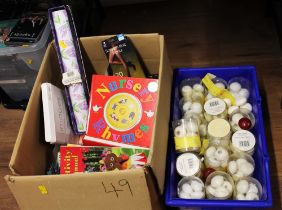 Two boxes of floating candles, children's books,