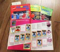 Four Panini Football sticker books for 1981, 1985,