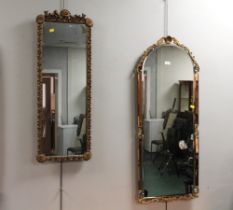 Two ornate wall mirrors in gold coloured frames,