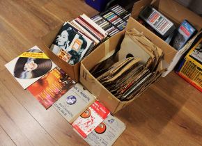 Five boxes of Bakelite records, vinyl LP's, cassettes,