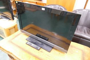 36" Sony television with remote control