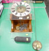 Pendulum and weight driven clock movement in Perspex case