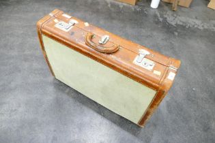 Vintage Victor Luggage leather bound suitcase