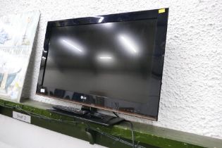 36" LG television with remote control