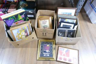 Three boxes of pictures and frames
