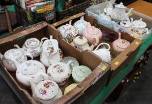 Three boxes of floral and decorated teapots and quantity of coloured sherry glasses