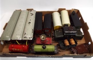 Collection of 0 gauge tin plate rolling stock, carriages, tankers, diesel locomotive,