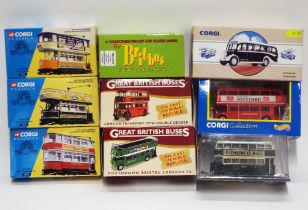 Collection of diecast buses and trams,
