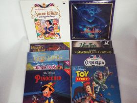 Collection of laser discs mostly Disney, box set Snow White & The Seven Dwarfs, deluxe edition,