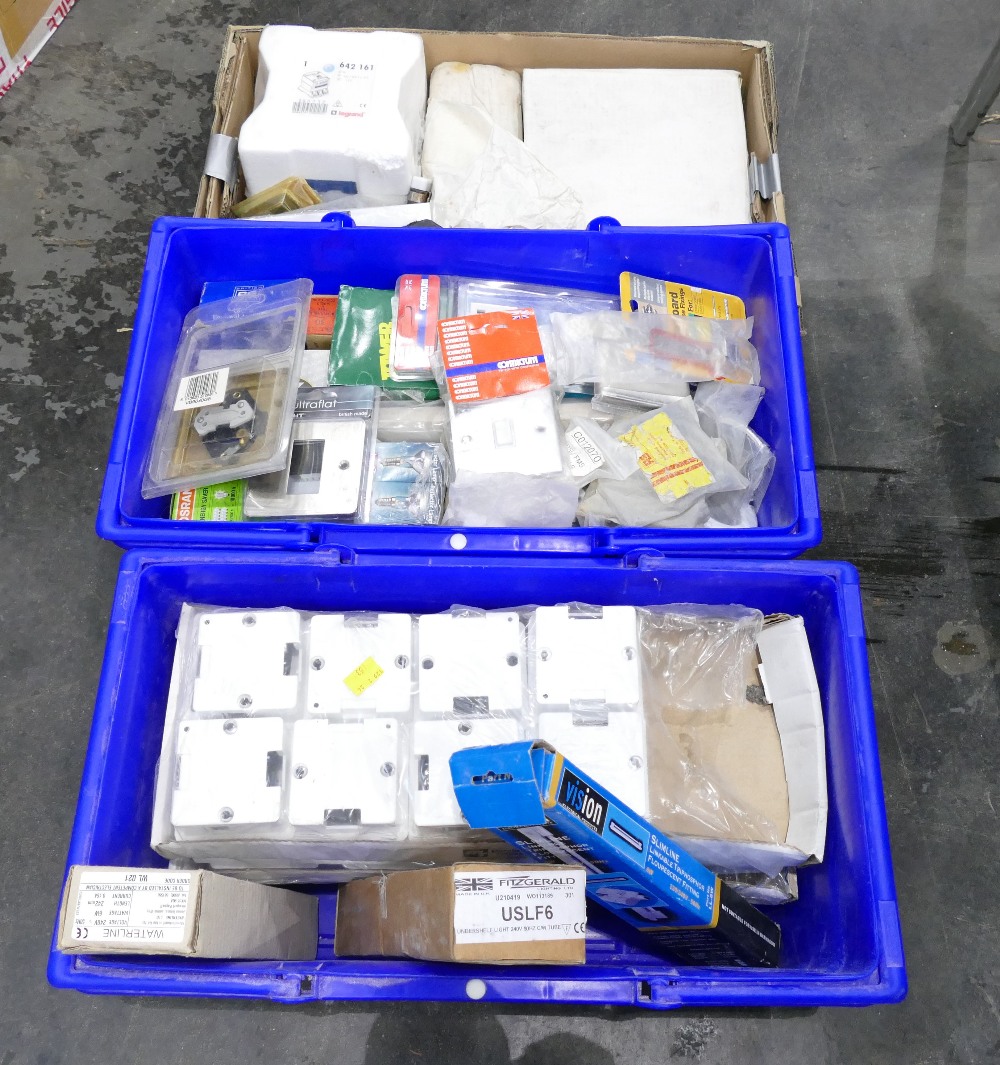 Three boxes of electrical equipment and components, light switches, sockets,