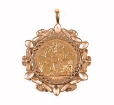 A Victorian gold sovereign 1898 old head, in gold coloured metal mount. 12.