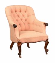 A Victorian armchair with upholstered back and seat,