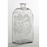 A 19th century decanter, with engraved floral sprays and pontil mark to the base. Height 26 cm.