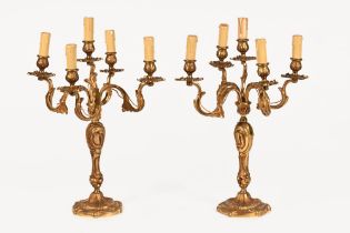 A pair of brass candelabra converted to electricity. Height 55 cm, width 35 cm (see illustration).