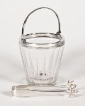 A cut glass ice bucket, with silver plated rim and a set of silver plated claw handed sugar tongs.