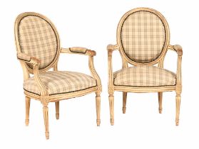 A pair of continental armchairs in the Louis XVI style,