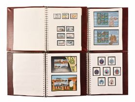 Four albums of Mint Guernsey stamps, in well presented albums, includes Mint sets,