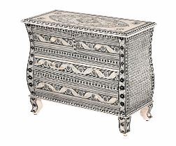 A bone veneered chest of drawers,